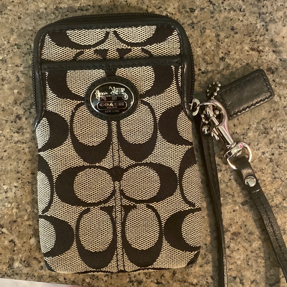 Beautiful Coach phone wallet carrier